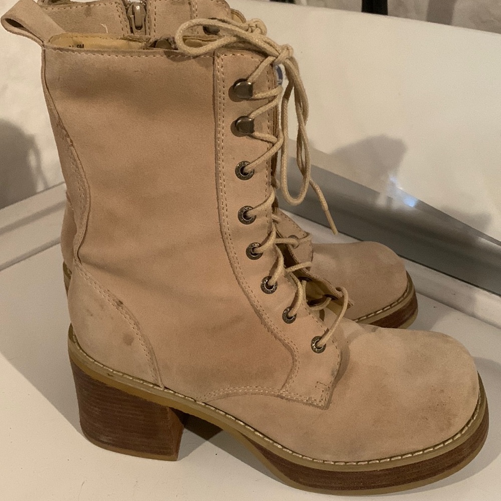 Candies zip up boot with heel.